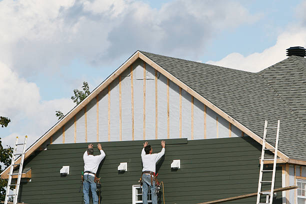 Professional Siding technician working in Stem, NC